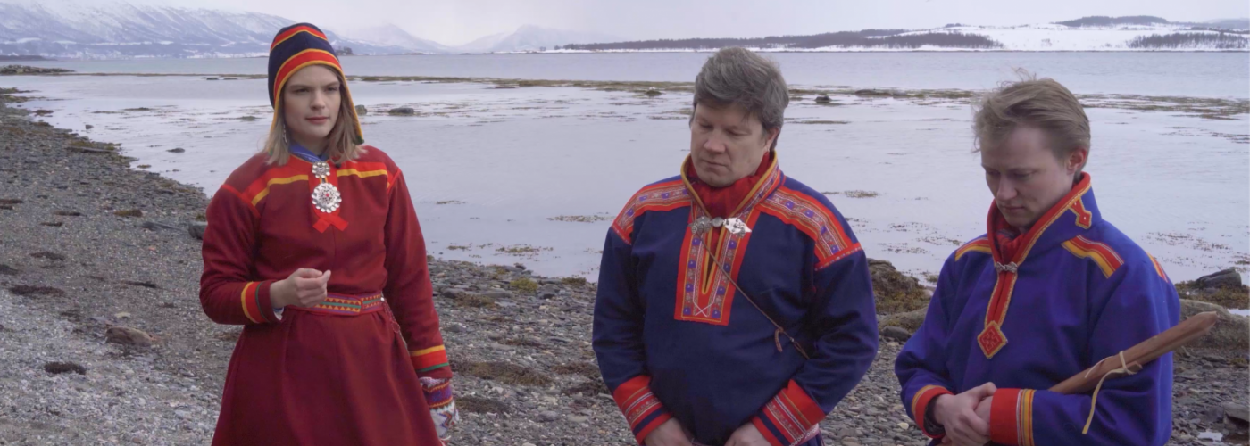 Screenshot of a digital Sámi Yoik curated by Sámi Lávdi in a video from Jamie Michael Bivard for Dansearena nord and IETM. Screenshot of a digital Sámi Yoik curated by Sámi Lávdi in a video from Jamie Michael Bivard for Dansearena nord and IETM.