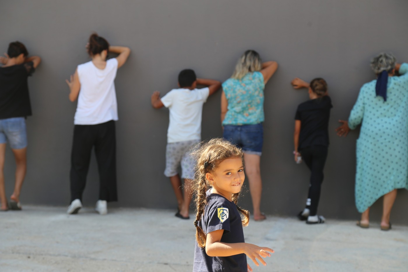 playing a traditional game against a wall