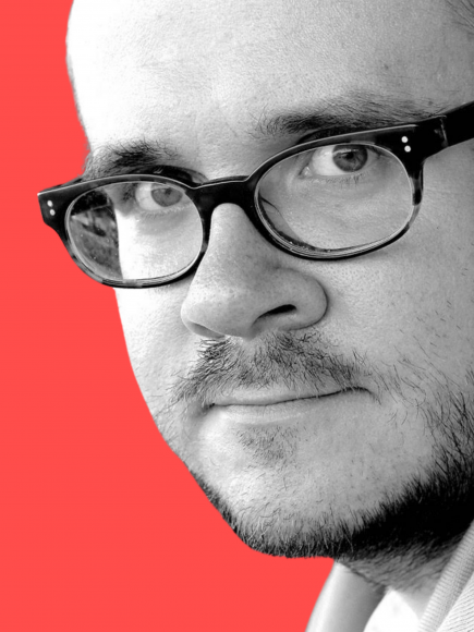 Profile picture of Grzegorz Reske on orange background