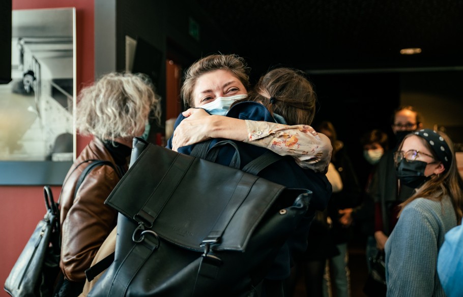 Participants of IETM Lyon 2021 hugging each other