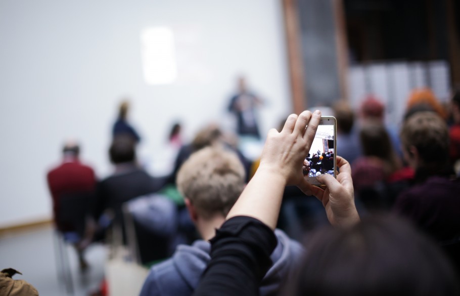 Picture of a participant of IETM Budapest 2015 taking a picture of the stage