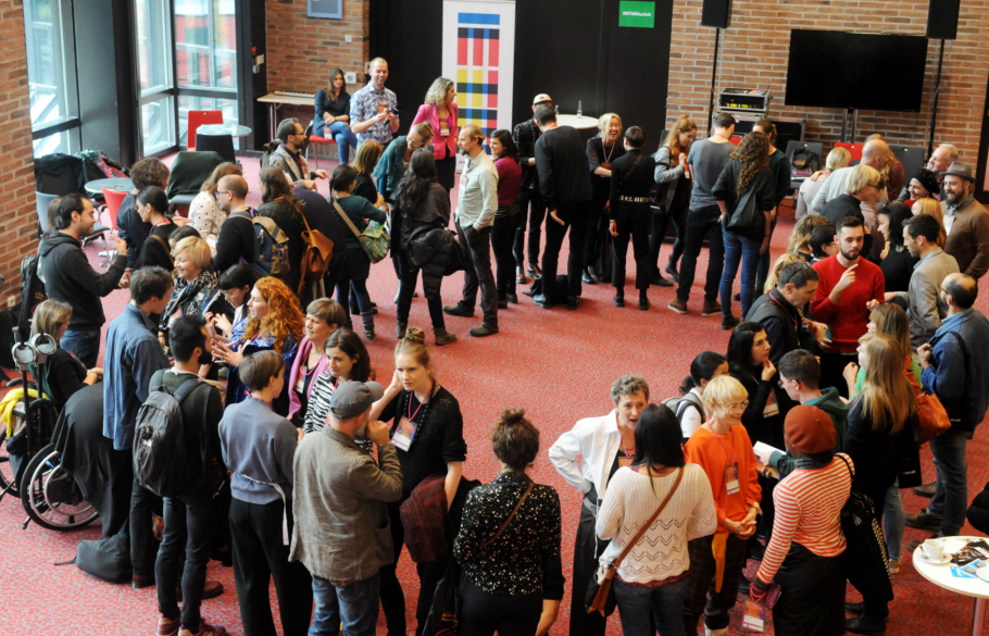 Participants of IETM Munich 2018 taking part in a networking activity in a circle