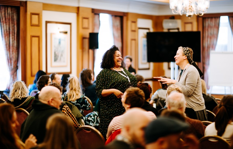 Picture of participants of IETM Hull 2019 laughing in a venue