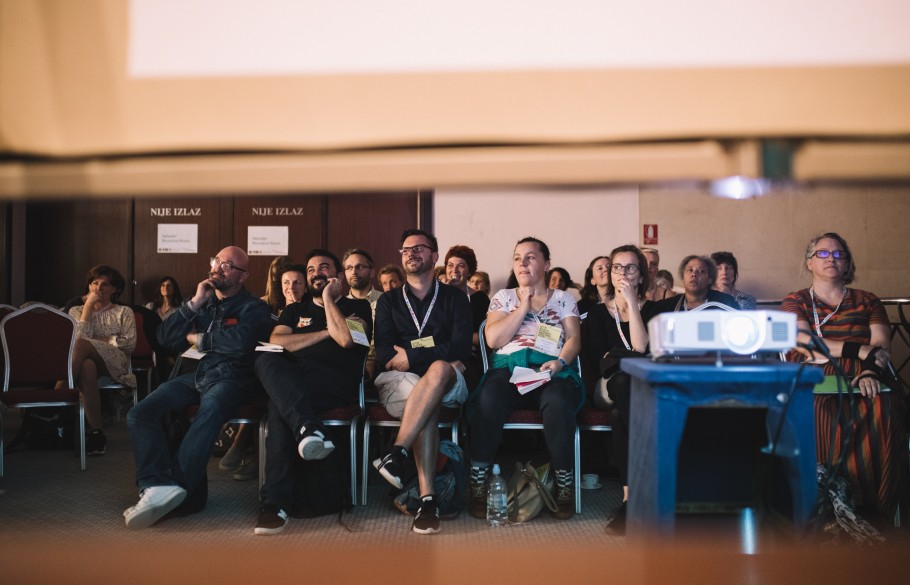 Picture of participants of IETM Rijeka 2019 watching a projection on a screen