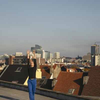 dancer on the rooftops of Brussels for the 900 Satellites performance 