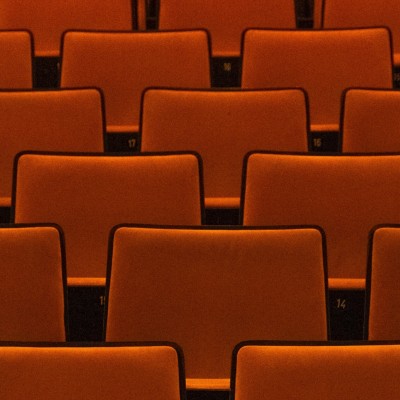 ©️ DynamicWang Orange seats in an empty venue